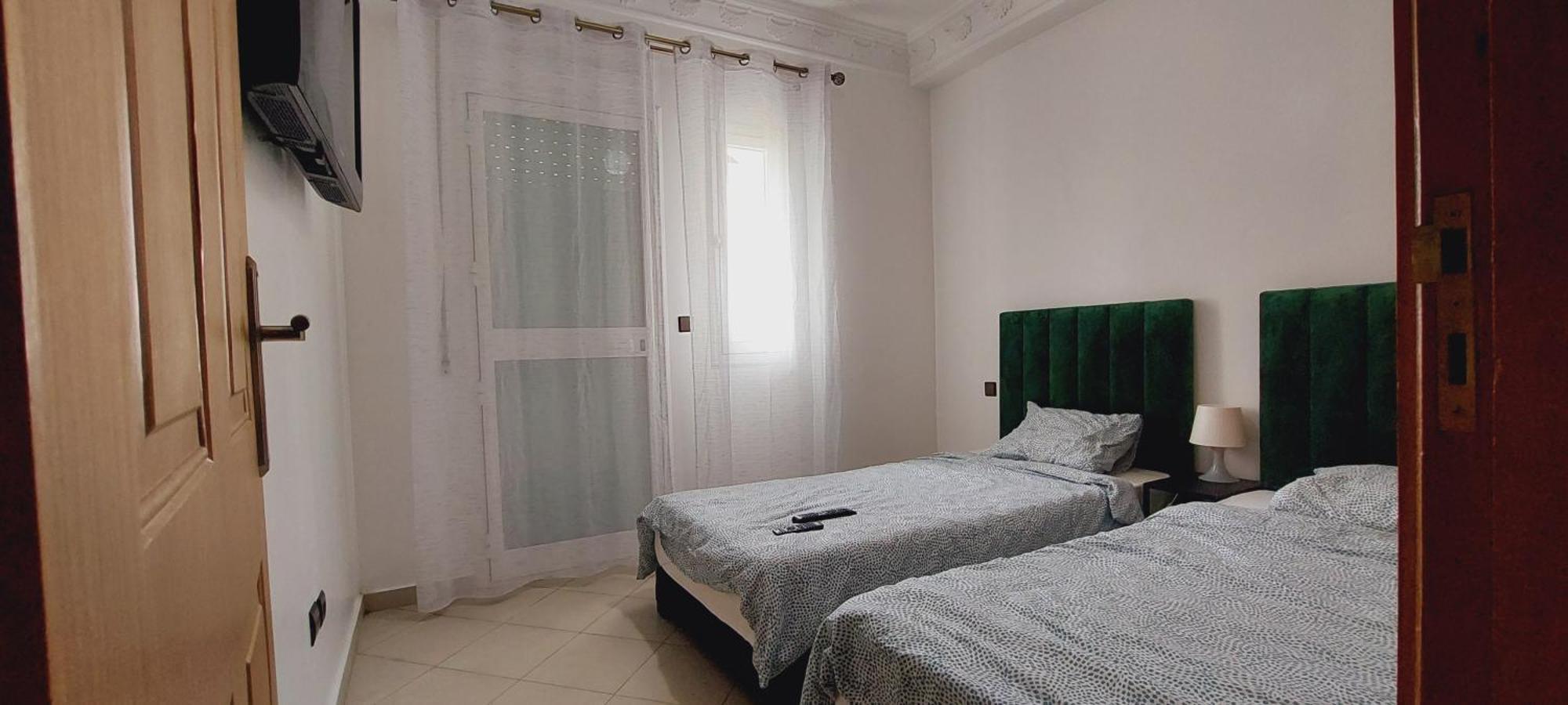 Appartement Avec Piscines, Vue Sur Mer Et Acces A La Plage A Achakar Hill, Tanger. Exterior photo
